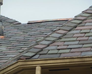 Davinci Slate Roof with Copper Ridge Cap